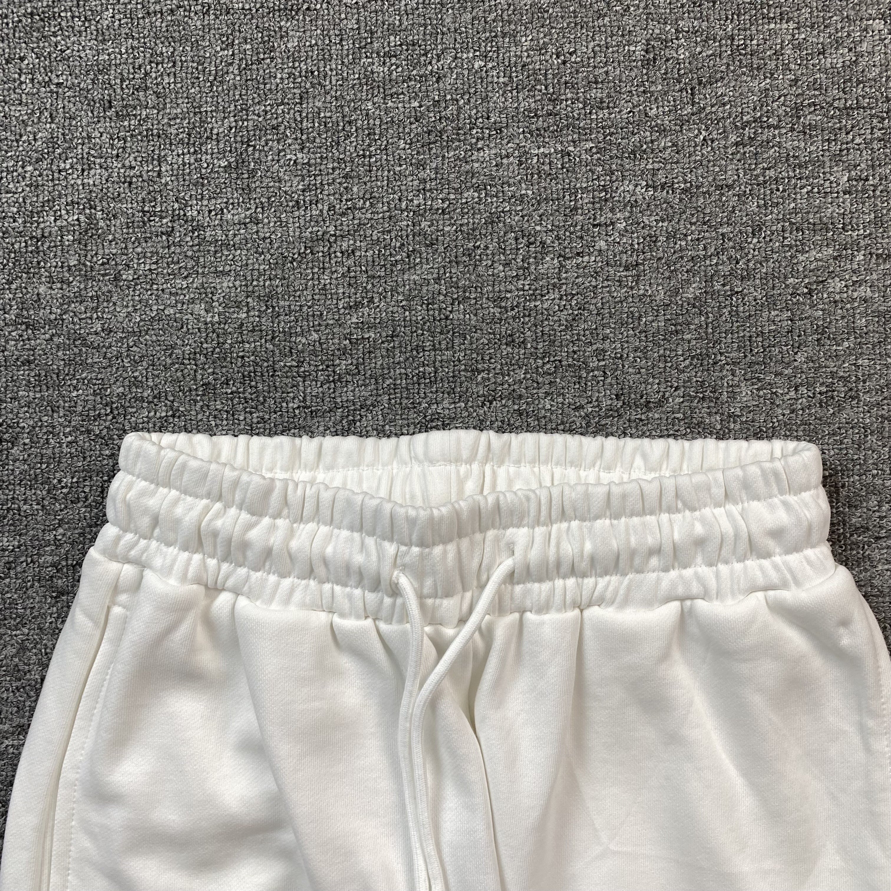 DENIM TEARS COTTON WREATH SWEATPANTS WHITE