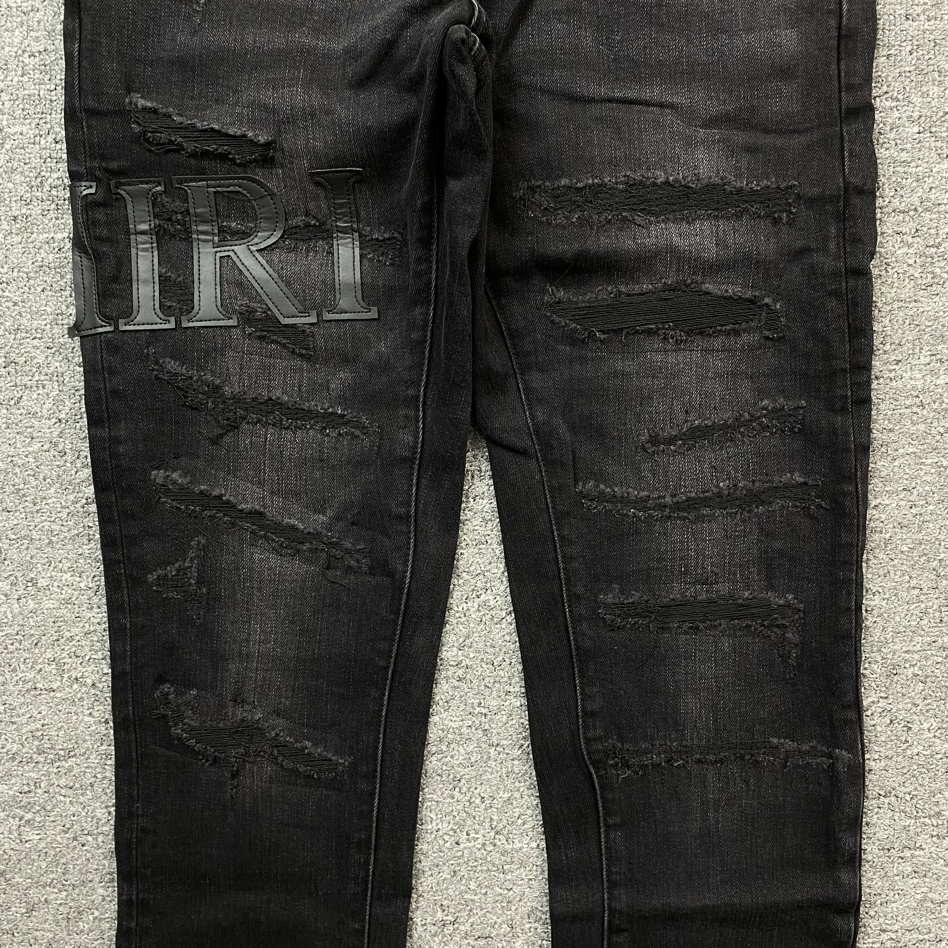 AMIRI CORE APPLIQUE BLACK LEATHER JEANS