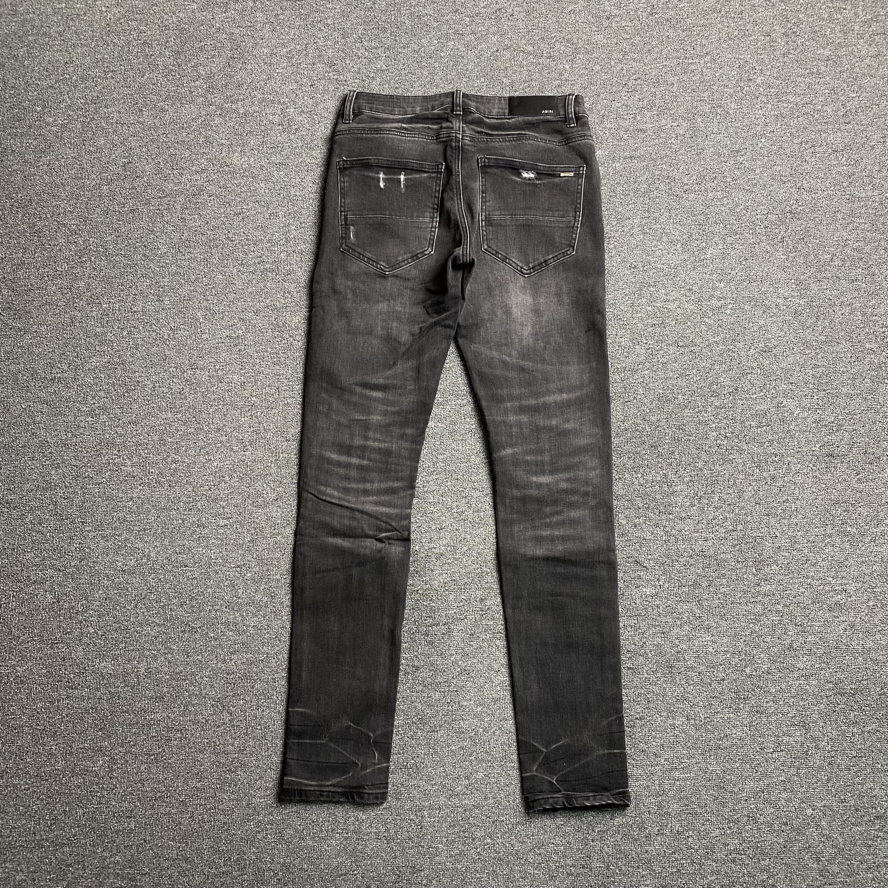 AMIRI SLASH SLIM JEANS