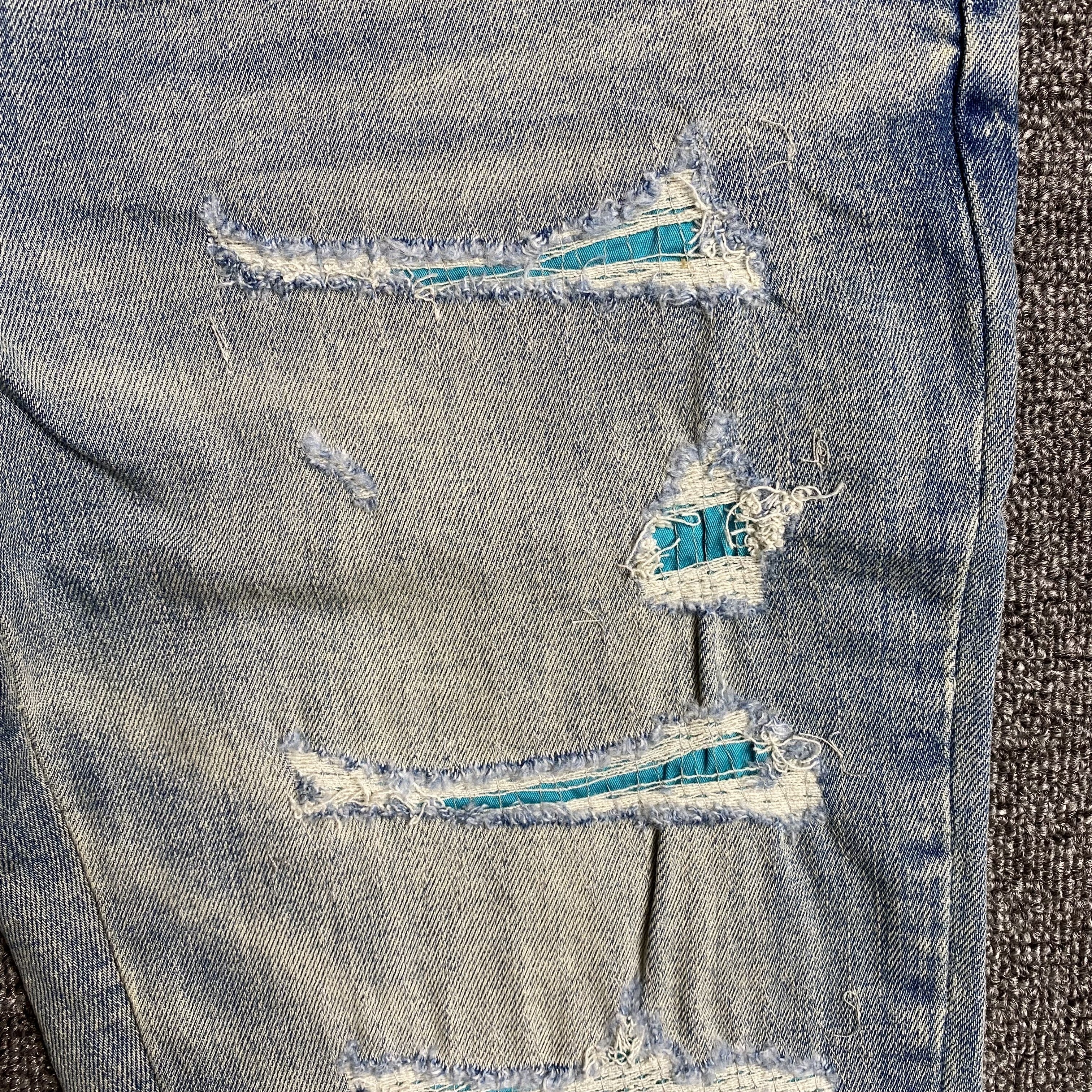 AMIRI VARSITY LOGO JEANS