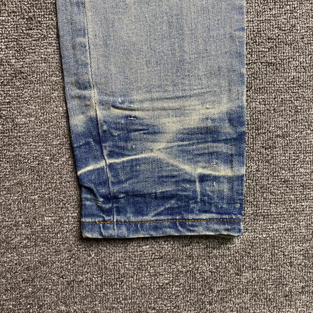 AMIRI VARSITY LOGO JEANS