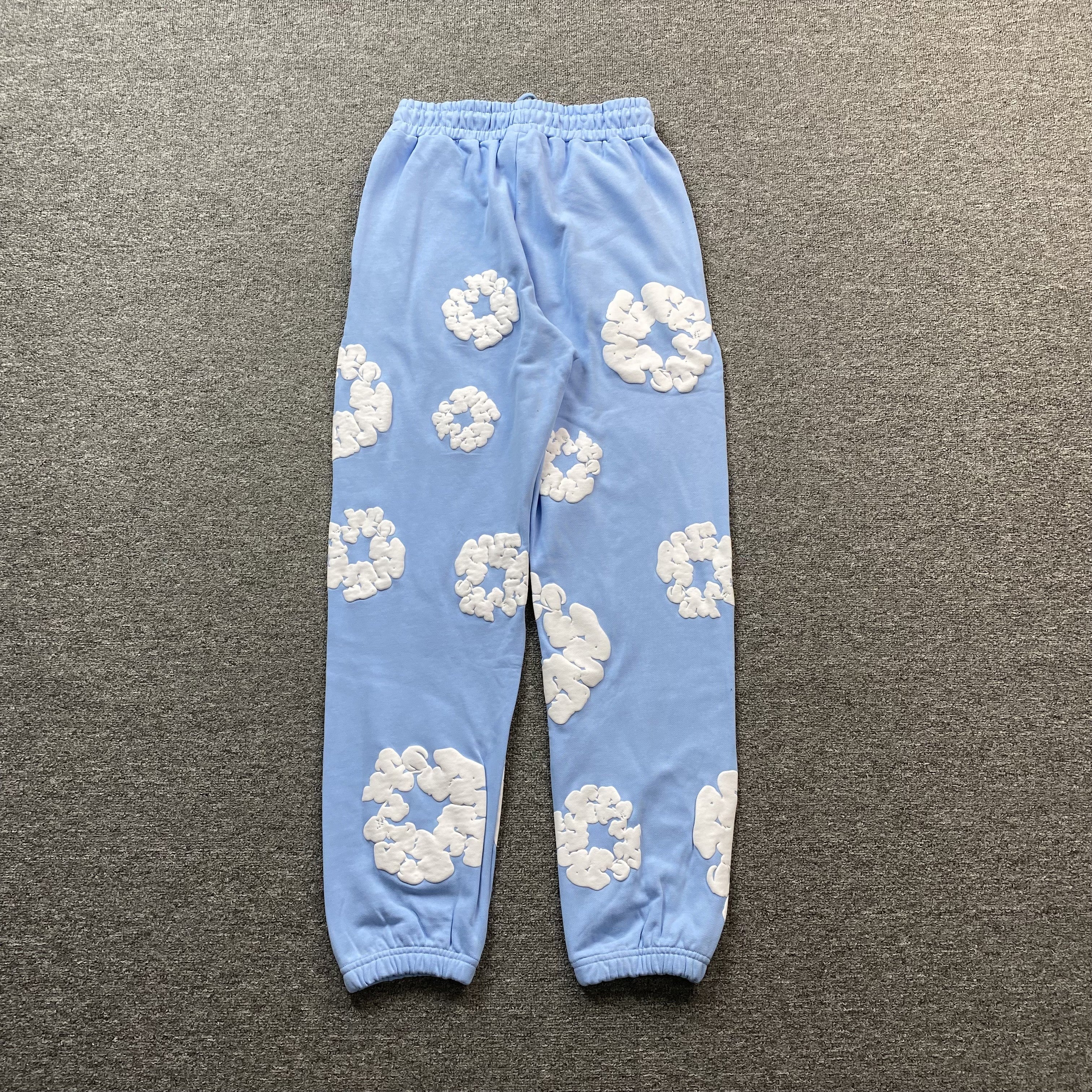 DENIM TEARS COTTON WREATH SWEATPANTS BABY BLUE
