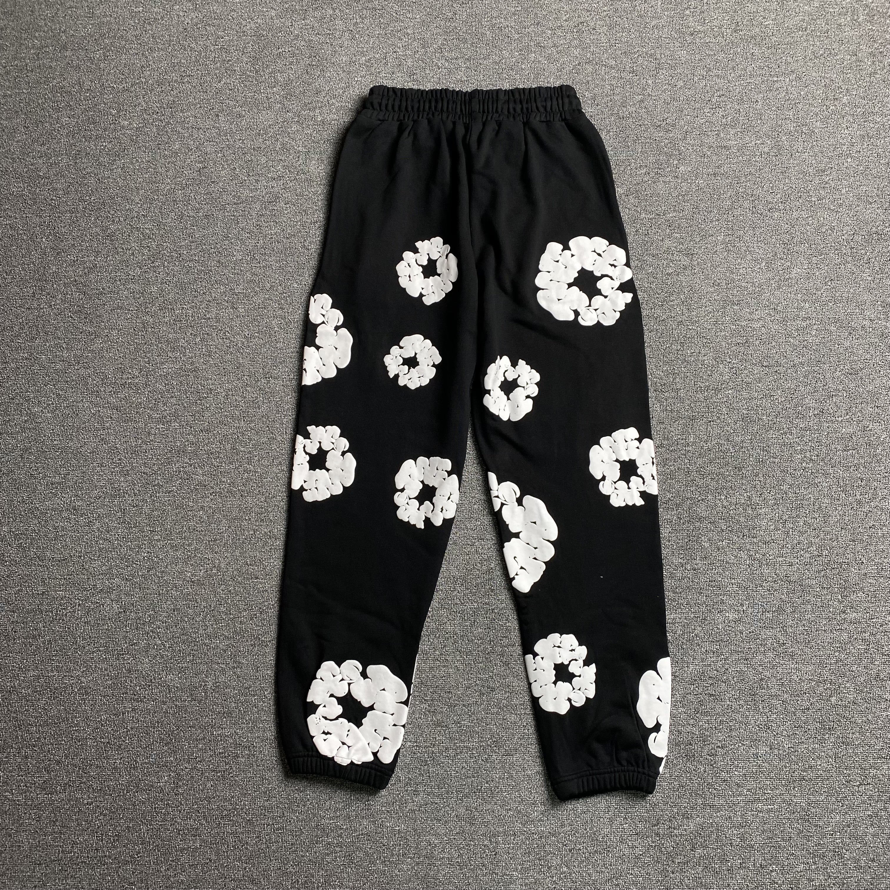 DENIM TEARS COTTON WREATH SWEATPANTS BLACK