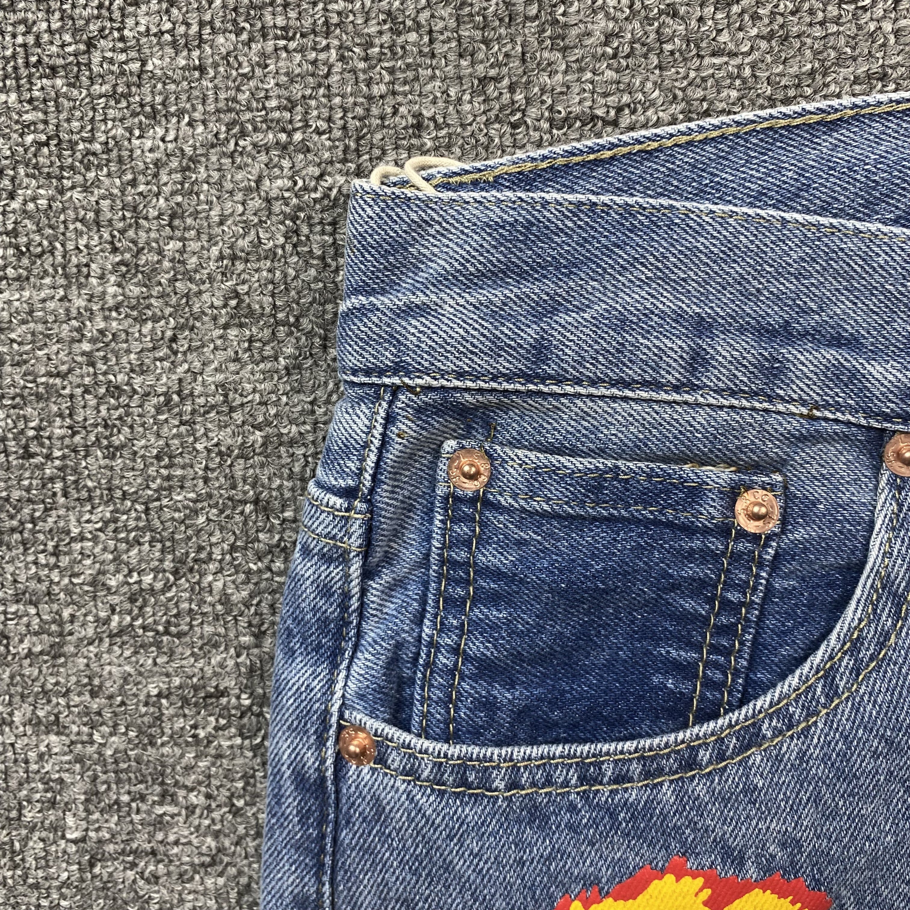 DENIM TEARS x OFFSET JEANS LIGHT WASH